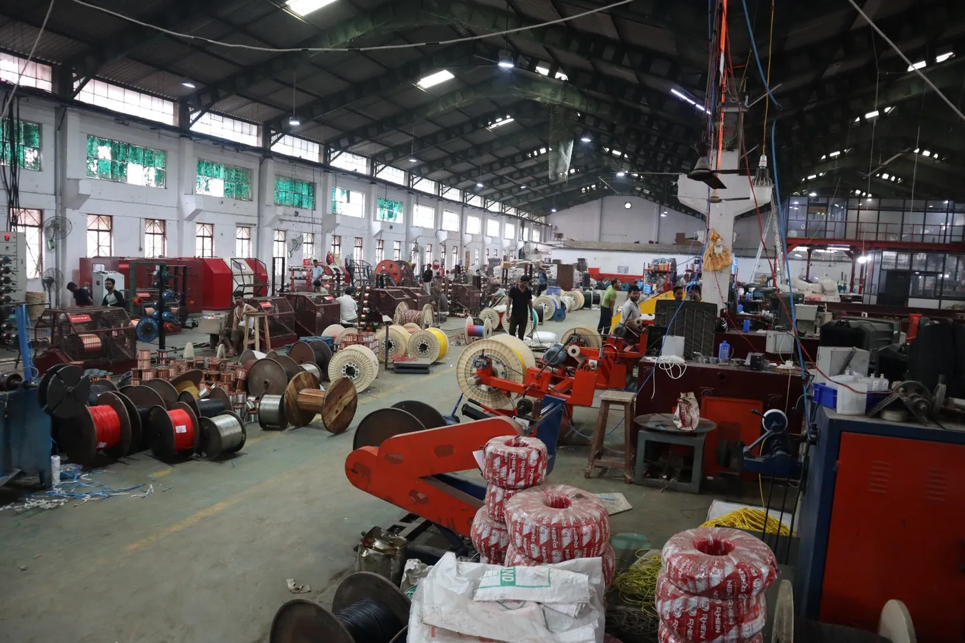 Stranding and bunching machines with finished wire spools