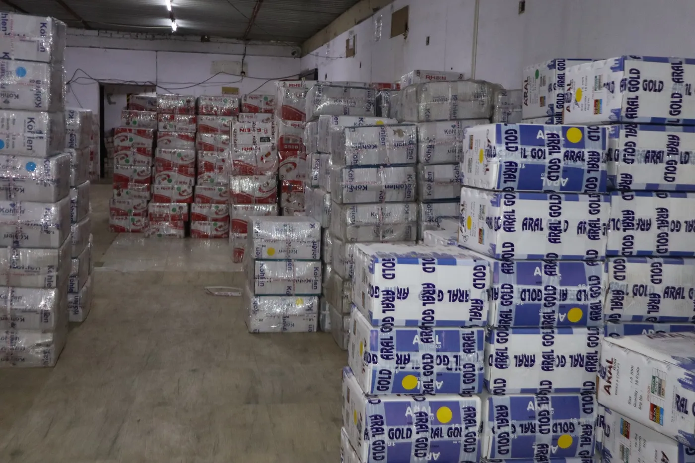 Shrink-wrapped Rhein wire cartons palletised in the finished-goods warehouse